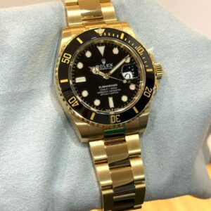 PRE-OWNED ROLEX 126618LN SUBMARINER DATE BLACK DIAL YELLOW GOLD OYSTER BRACELET WITH CERT YEAR 2024