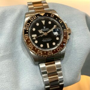 PRE-OWNED ROLEX 126711CHNR GMT-MASTER II ROOTBEER BLACK DIAL OYSTER HALF GOLD BRACELET WITH CERT YEAR 2021