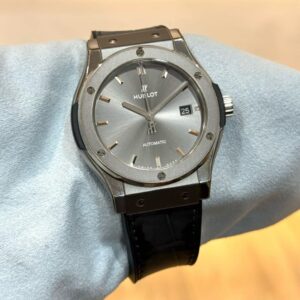 PRE-OWNED HUBLOT CLASSIC FUSION 542.NX.7071.LR GREY DIAL WITH CERT YEAR 2025