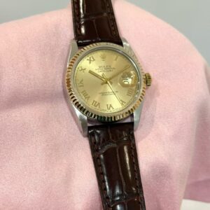 PRE-OWNED ROLEX 16013 DATEJUST-36 YELLOW GOLD ROMAN DIAL LEATHER STRAP WATCH ONLY
